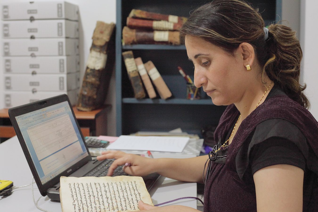 Nuhad ‘Abd al-Masih Boutros entering manuscript metadata at CNMO